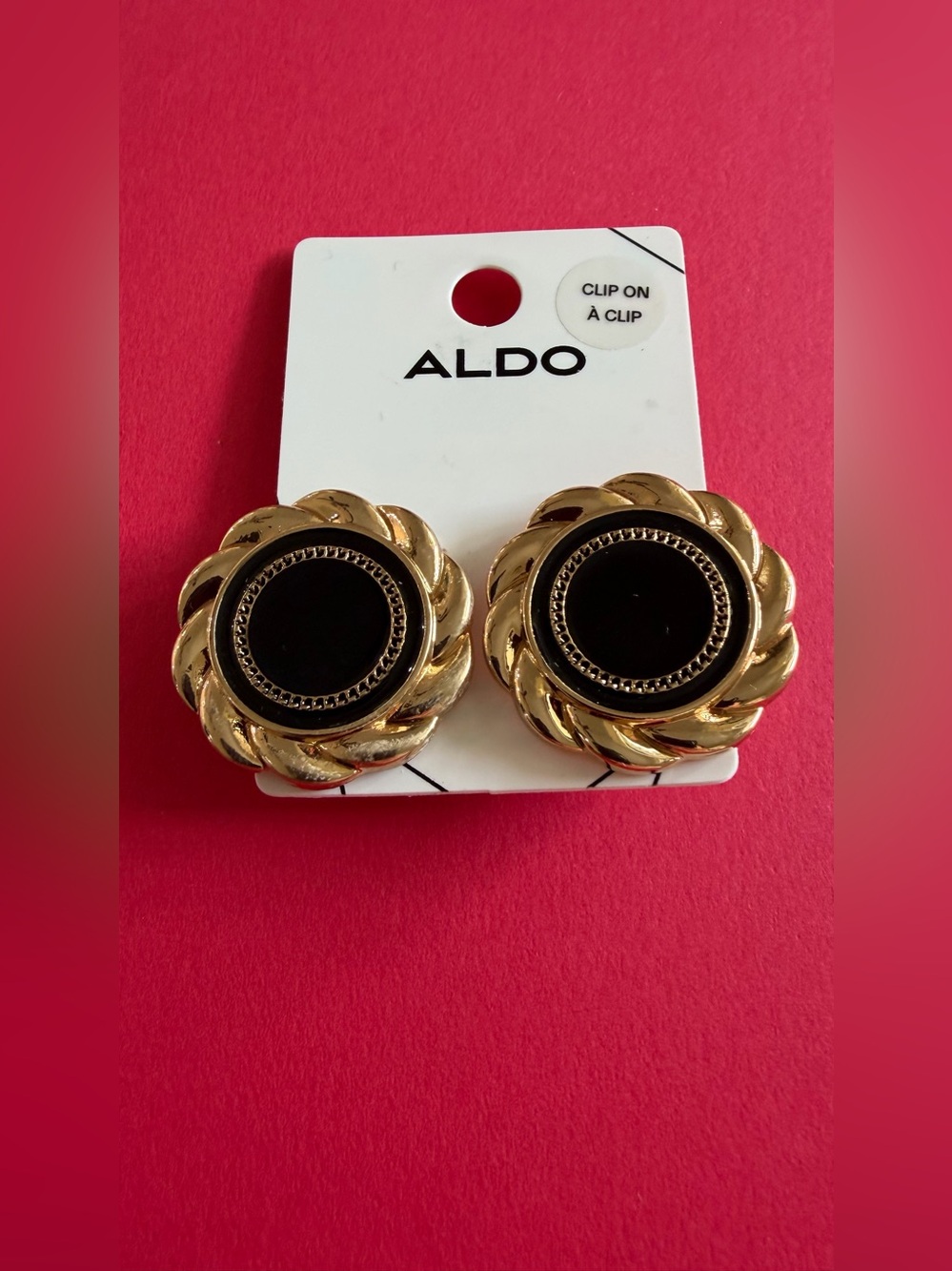 1.1”ALDO Gold and Black Twisted Hoop Clip-On Earrings